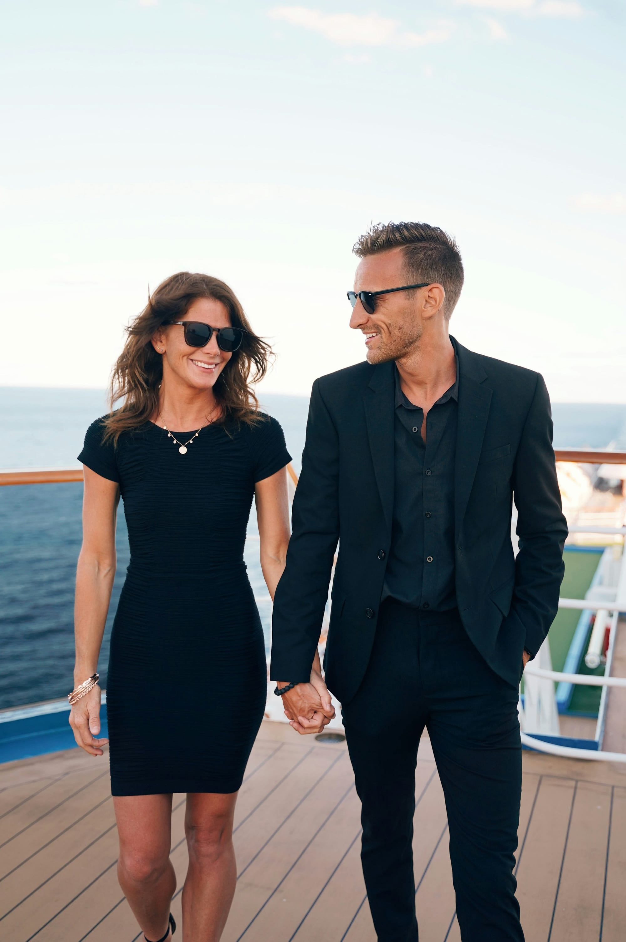 A successful couple on a boat cruise enjoying life